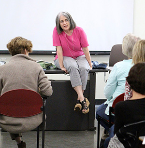 Susan Campbell Bartoletti speaking with writers at a conference